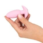 Cuties - Vibrerende Mini Buttplug Roze hand